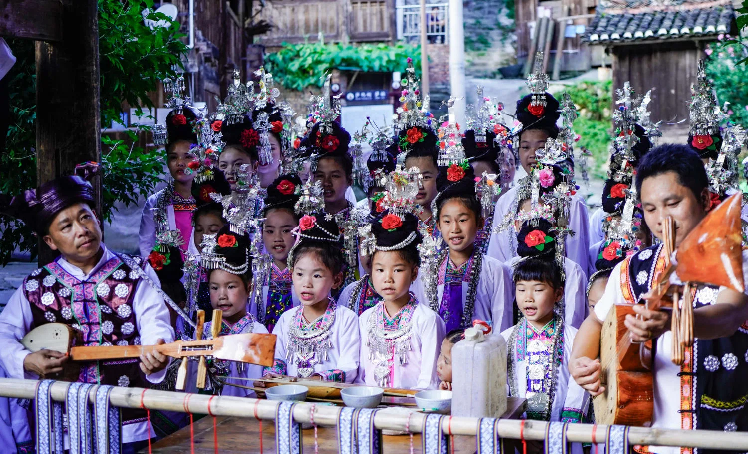 A group of children in Zaidang Dong Village singing the traditional Dong Grand Songs together